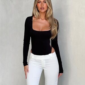 78. Tiger Mist • NWT $65 Minerva black long sleeve bodysuit PTP 13”-18”